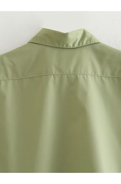 Camisa-curta-sem-mangas-verde-escuro-esquerda